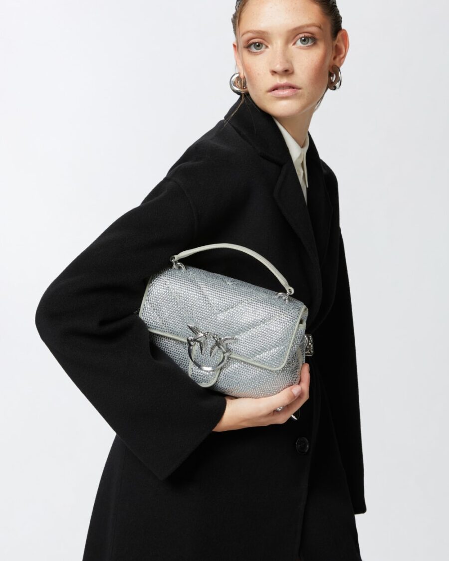 Borsa morbida Mini Love Bag Puff a tracolla trapuntata con strass argento e nickel lucido