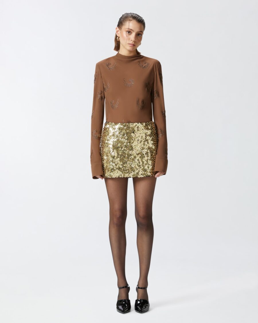 Minigonna con paillettes dorate e strass oro e crystal