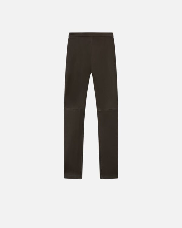 Pantaloni aderenti in nappa con zip al fondo