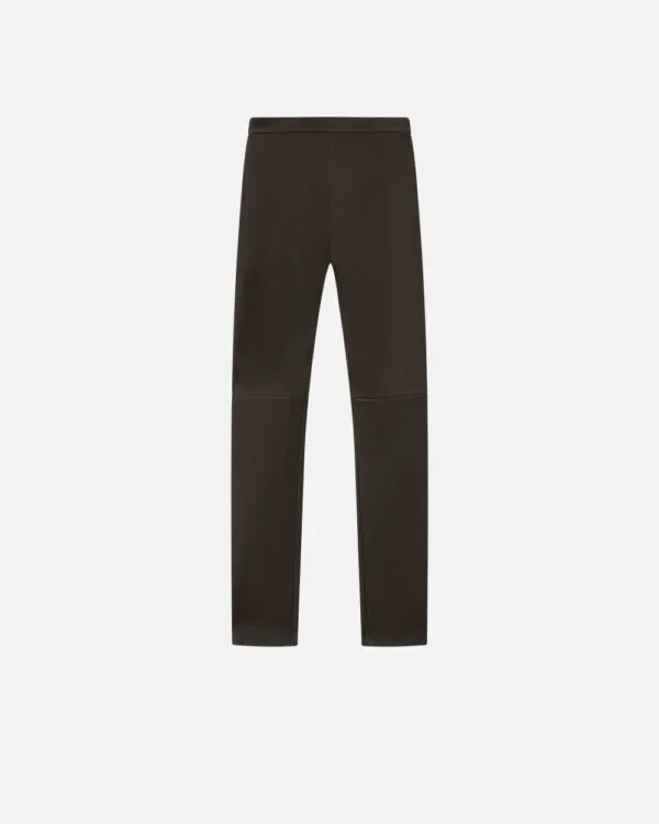 Pantaloni aderenti in nappa con zip al fondo
