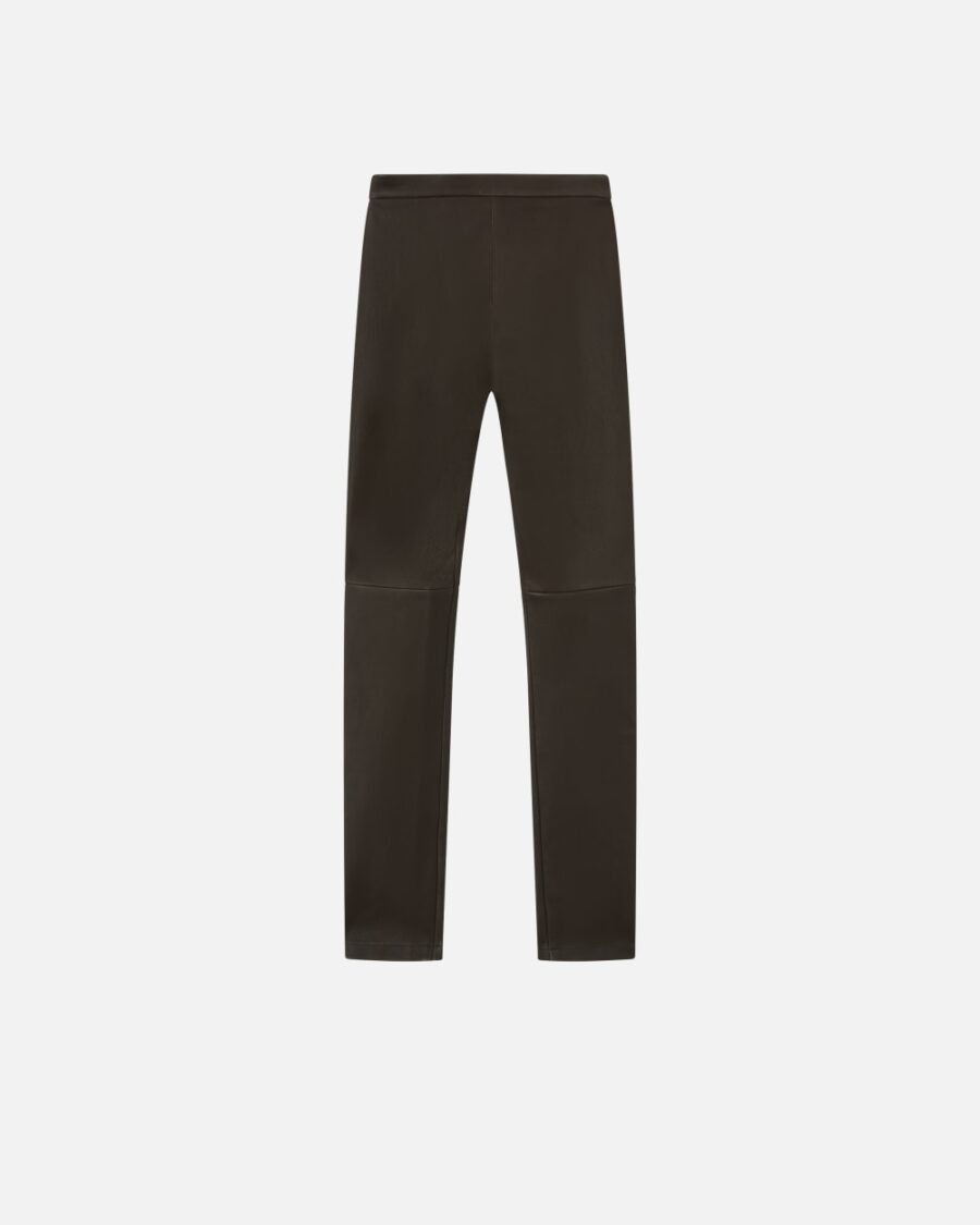 Pantaloni aderenti in nappa con zip al fondo - immagine 2
